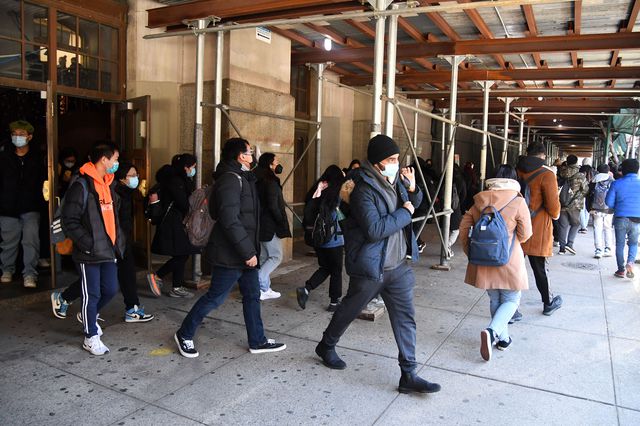 Students wearing coats leaving Brooklyn Tech in Brooklyn